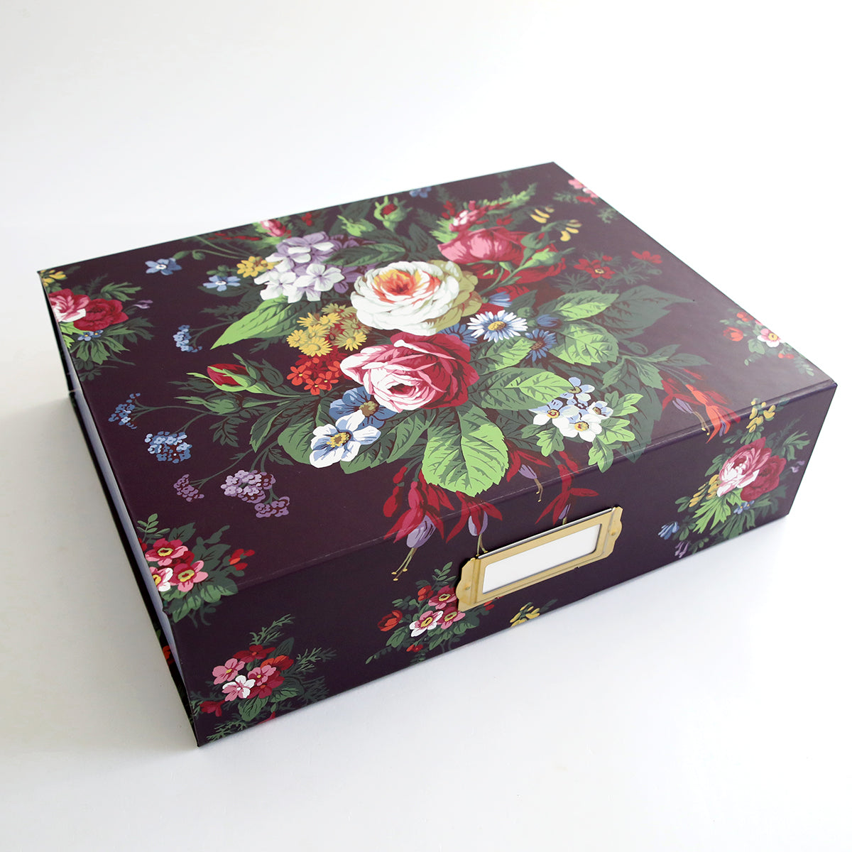 An Embellishment Storage Box - Astrid with a floral pattern.