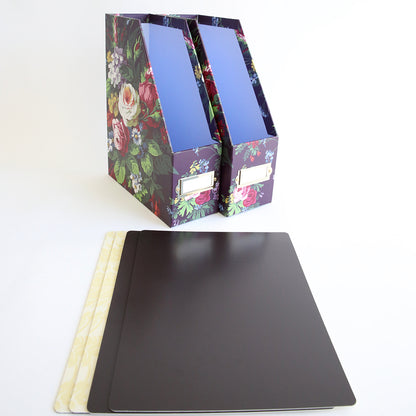 A black folder with a floral design on it that features a Set of 2 Die Storage Boxes - Astrid pattern.