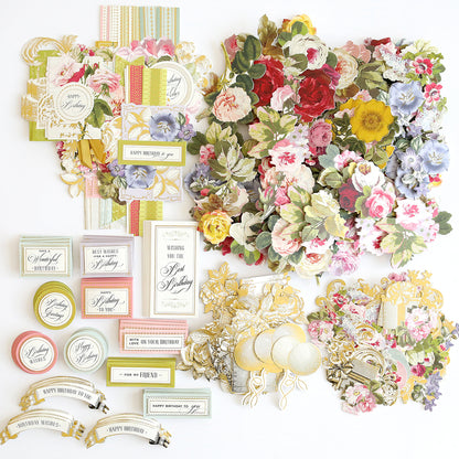 The Birthday Greetings Card Making Bundle features floral stickers, collage toppers, gold embellishments, and ribbon—ideal supplies for creating unique birthday cards.