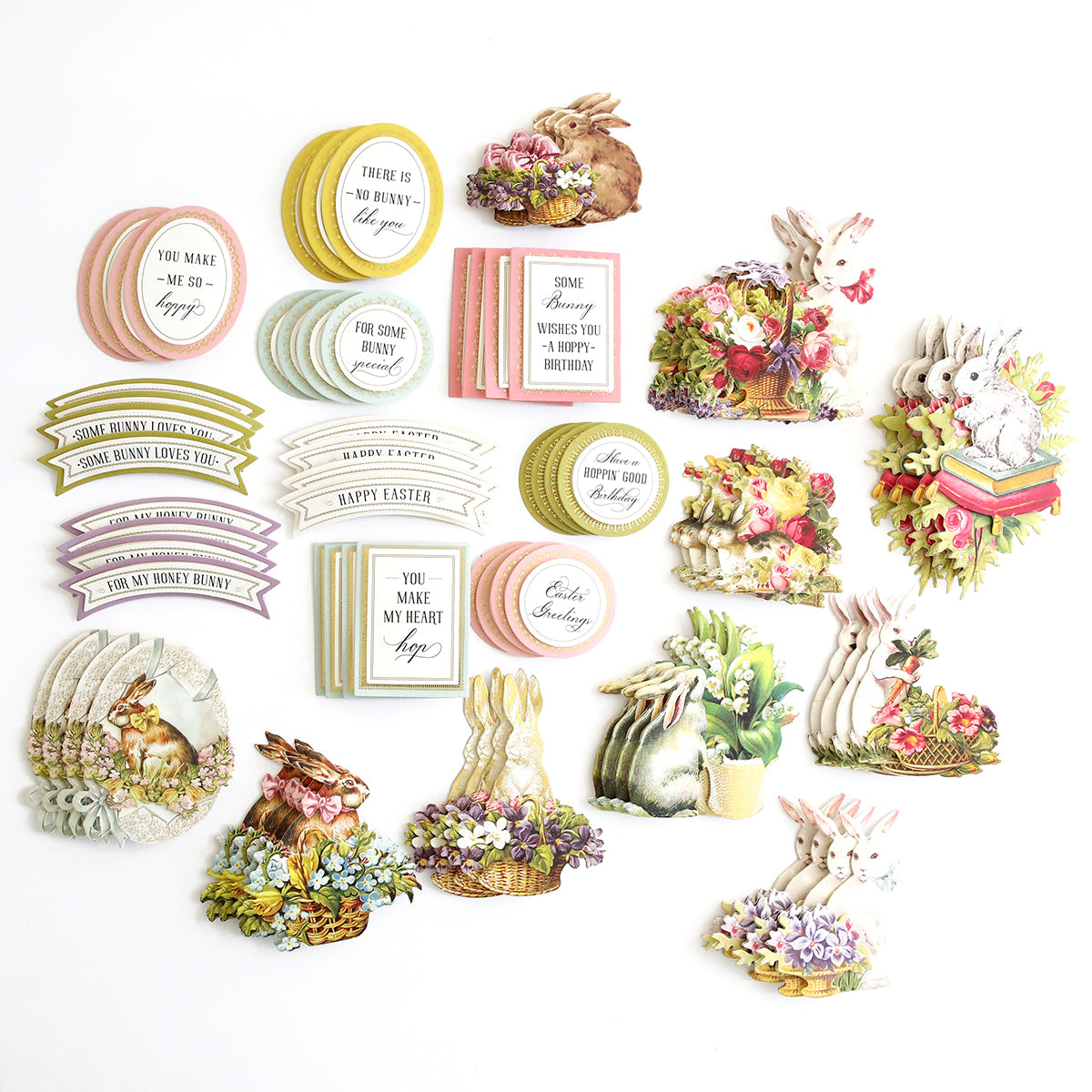 A delightful assortment of Easter cards featuring adorable Bunny Stickers and Sentiments designs, adorned with sentiments and stickers, presented on a pristine white surface.
