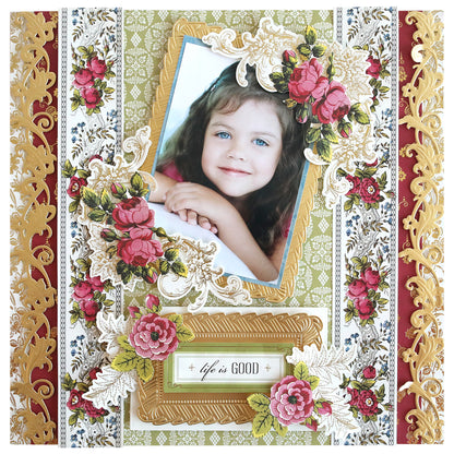 A framed photograph of a smiling child surrounded by ornate floral decorations and the phrase "life is GOOD" beneath the picture, all beautifully presented in a 3D Ribbon Frame Dies.