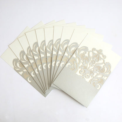 The Silver Laser Cut Pocket 10 pack includes ten elegant ivory and silver wedding invitations with laser-cut pockets, beautifully displayed in a fanned arrangement on a white background.