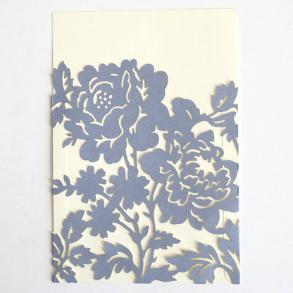 A slate blue rose diecut pocket, featuring an intricate floral cutout with large flowers and leaves—ideal for wedding invitations. Comes in a 10 pack.