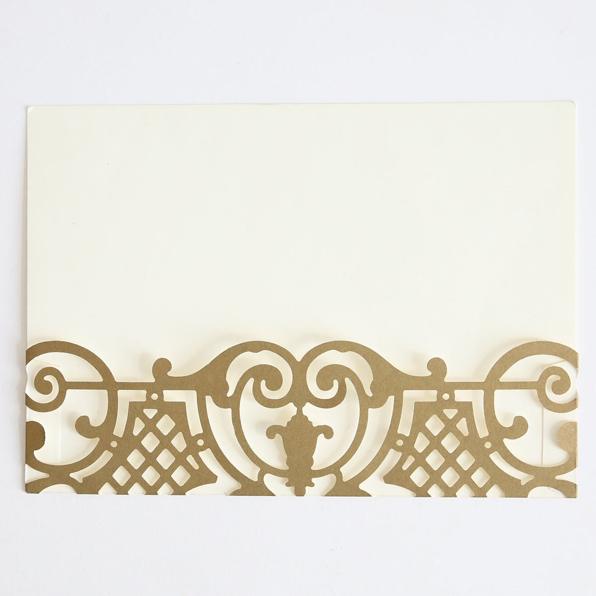 The Gold Diecut Pocket 10 pack features cream-colored cards with ornate gold laser-cut borders, ideal for creating custom wedding invitations or adding elegance to your event stationery.