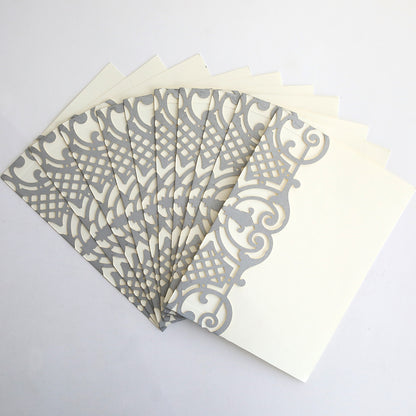 A 10-pack of Silver Diecut Pocket wedding invitations in cream, beautifully arranged in a fan shape on a white background.