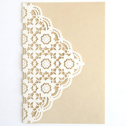 The Lace Laser Cut Invitation 10 pack features beige cards with an intricate white floral lace design on the left, ideal for wrapping elegant wedding invitations.