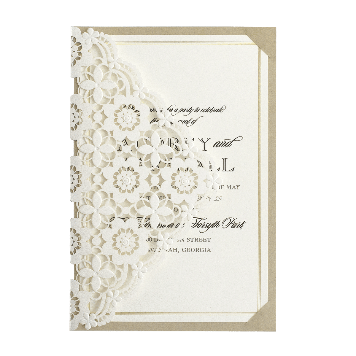 A white and gold wedding invitation with a laser cut design.