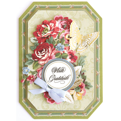 Featuring layered floral and butterfly designs, a blue bow, and a circular “With Gratitude” message on an ornate green and cream background, the Simply Gratitude Card Making Kit is perfect for creating your own handmade cards or enhancing your favorite gratitude card projects.