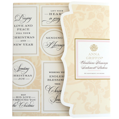 The Christmas Blessings Sentiment Stickers feature various holiday messages in black script on a cream background, perfect for adding heartfelt touches to your cards and gifts.