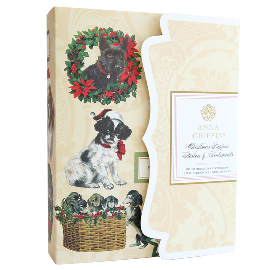 A decorative box featuring illustrations of puppies in holiday-themed settings, perfect for pet lovers, labeled "Christmas Puppies Stickers.