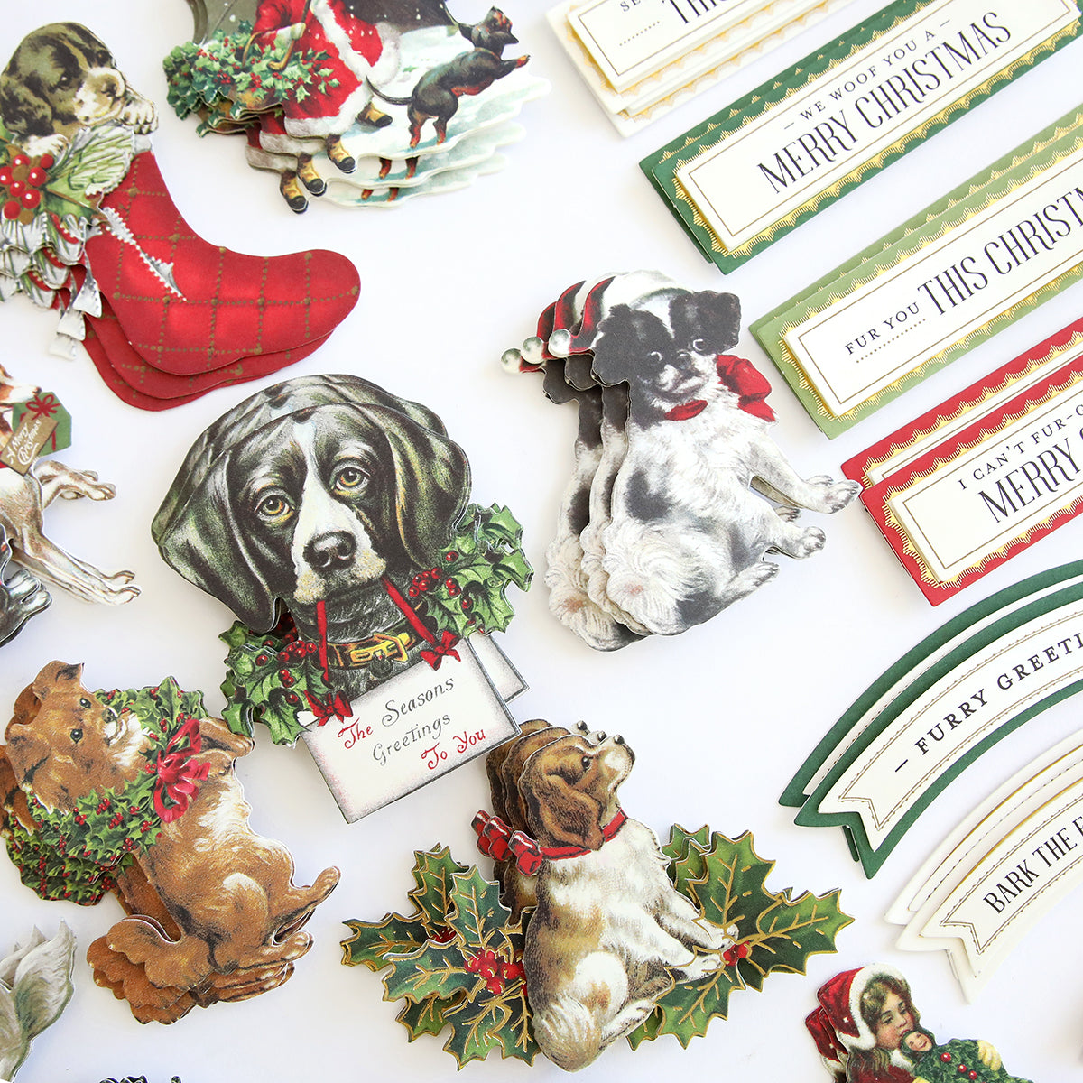 Christmas Puppies Stickers for pet lovers featuring illustrations of puppies, stockings, and holiday messages set on a flat white background.