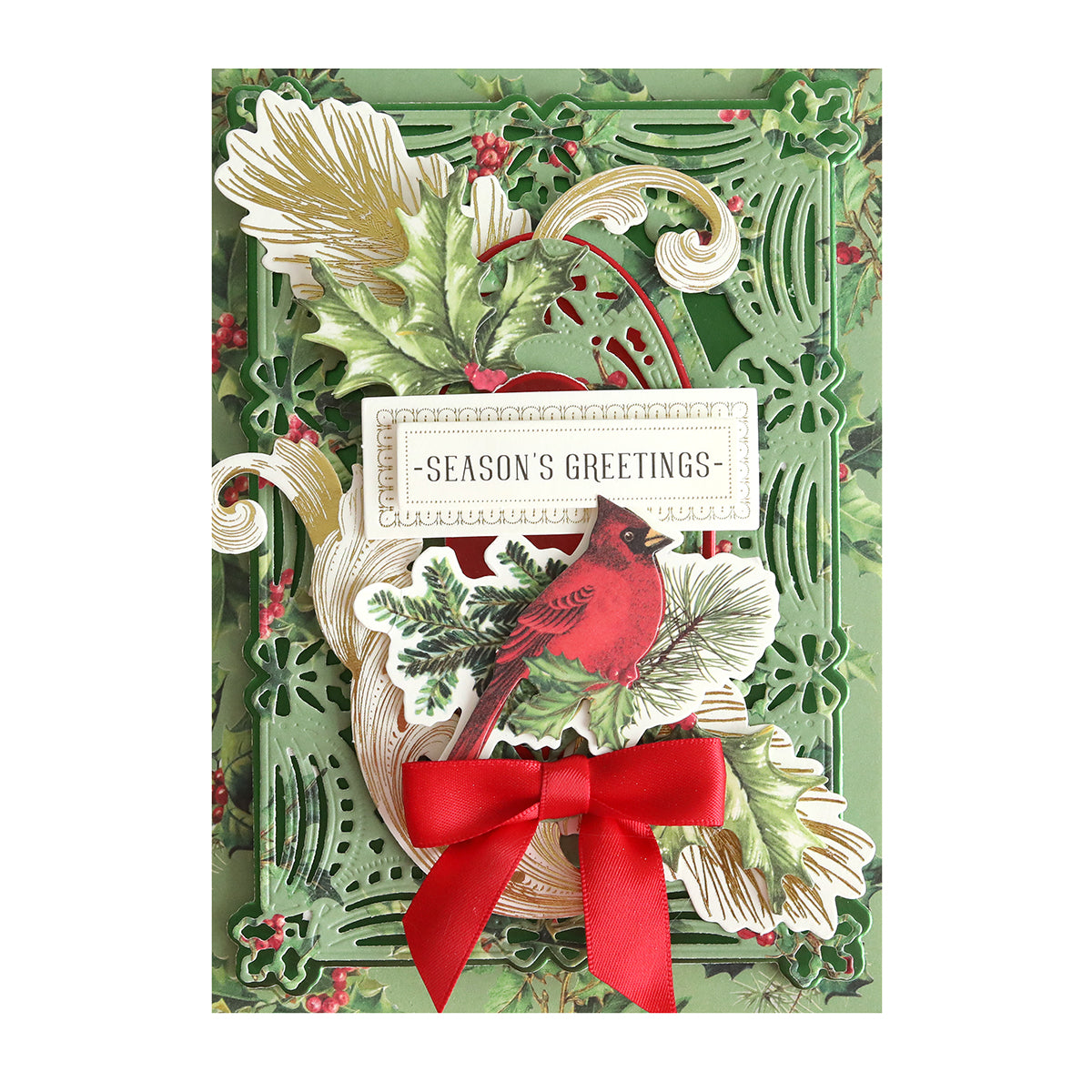 An Anna Griffin Christmas Wishes 3D Concentric Dies Christmas card featuring a cardinal and holly.