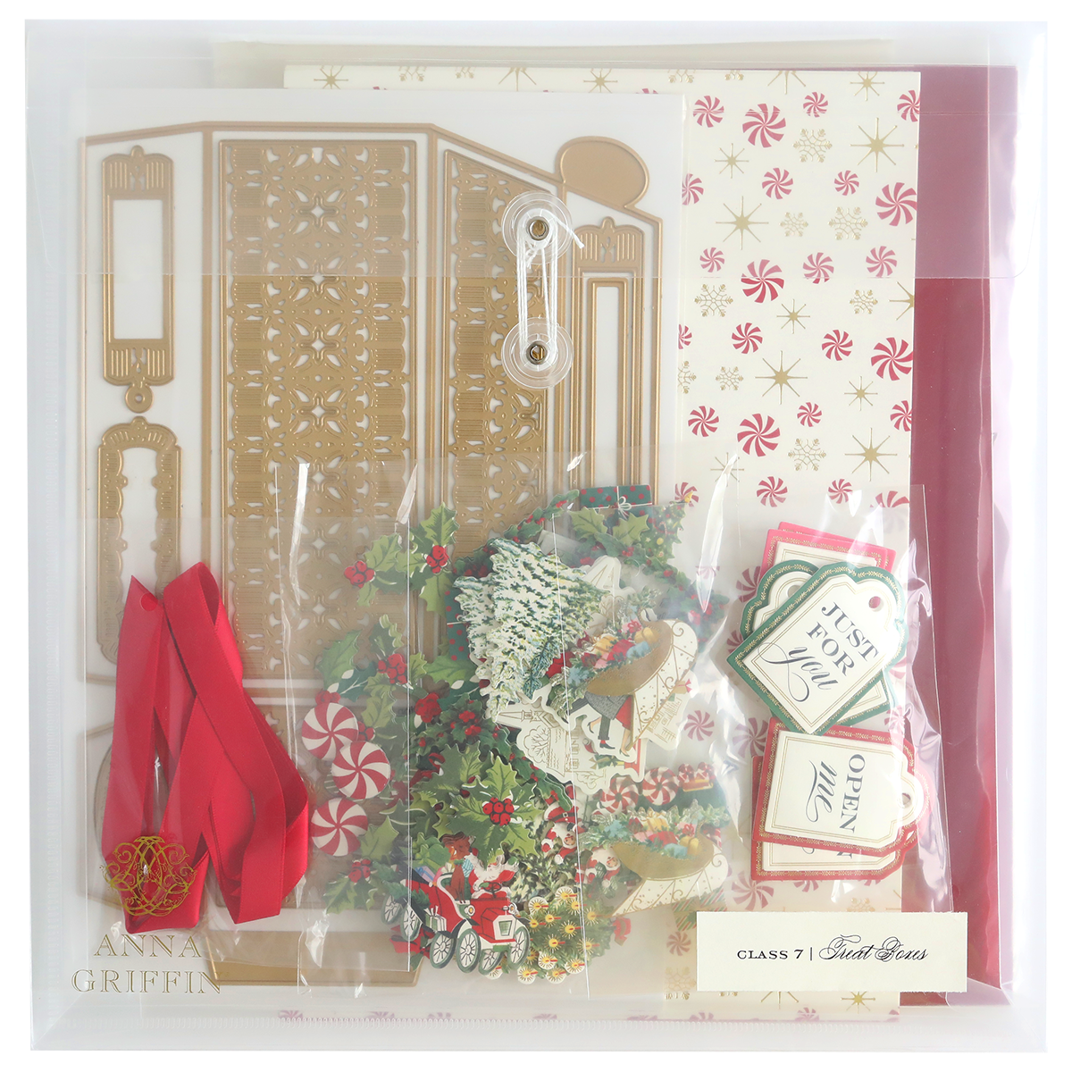 A collection of decorative materials under the name "Treat Boxes Dies and Materials," featuring cardstock, envelopes, ribbons, and festive-themed 3D embellishments to add extra flair to your creations.