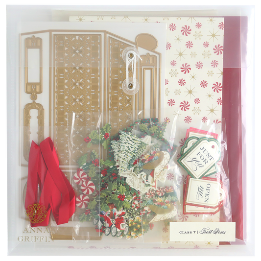 A collection of decorative materials under the name "Treat Boxes Dies and Materials," featuring cardstock, envelopes, ribbons, and festive-themed 3D embellishments to add extra flair to your creations.