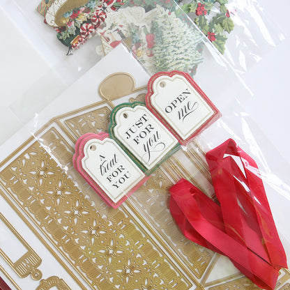 The Treat Boxes Dies and Materials feature gift tags with messages like "a treat for you," "just for you," and "open me," all beautifully complementing red ribbons. Decorative cardstock cutouts add extra flair, making them ideal when paired with 3D embellishments.