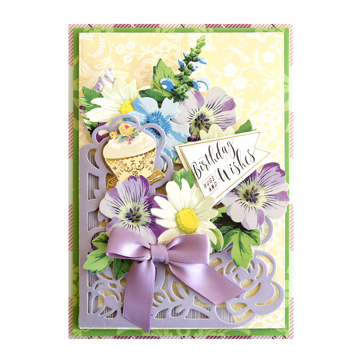 An elegant Anniversary Pocket Dies adorned with flowers and a bow.