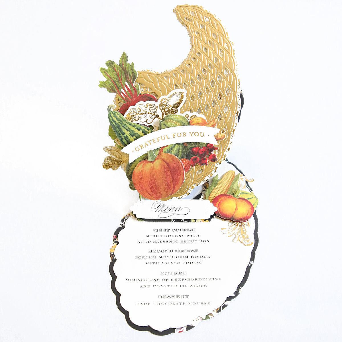A decorative Thanksgiving menu featuring an autumn harvest design, inspired by seasonal décor and ideal for card making enthusiasts. This elegant menu, crafted with the Cornucopia Easel Card Dies, lists four courses: salad, mushroom risotto, beef medallions with potatoes, and dark chocolate mousse for dessert—beautifully presented in a sophisticated layout.