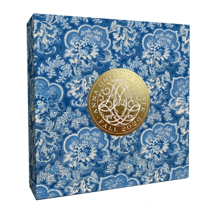 Square box with blue and white floral pattern, featuring a large gold seal reading "Anna Griffin Create Fall 2026," perfect for fans of online craft classes and creative communities.