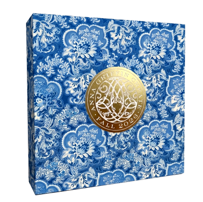 A blue and white floral box with a gold seal reading "Anna Griffin | Create Fall 2026"—perfect for adding heritage style to your home or storing craft class supplies.
