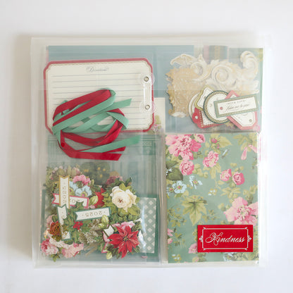 Anna Griffin | Create 2025 is a clear organizer with floral paper, ribbon, tags, note cards, and "Kindness" labels—perfect for papercrafting events or inspiring new crafting techniques.
