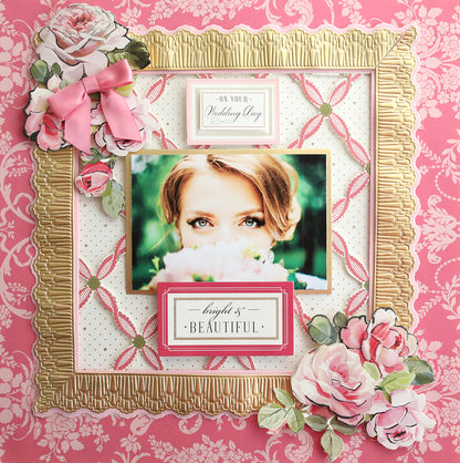 A decorative wedding photo frame with a picture of a woman partially hidden behind a bouquet. The frame features floral designs, a pink bow, and text reading "ON YOUR Wedding Day" and "bright & BEAUTIFUL." It also has an intricate 3D Ribbon Border 12" Dies adding elegance to the overall design.