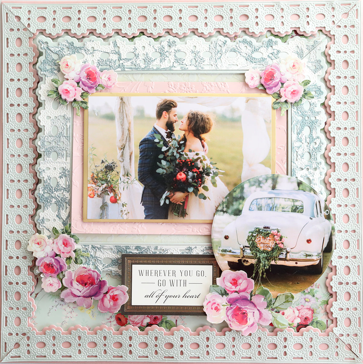 A decorative wedding photo frame featuring a couple embracing, surrounded by floral designs and an image of a car with "Just Married" sign. Embellished with scrapbook pages and 3D Ribbon Border 12" Dies, the text reads, "Wherever you go, go with all of your heart.
