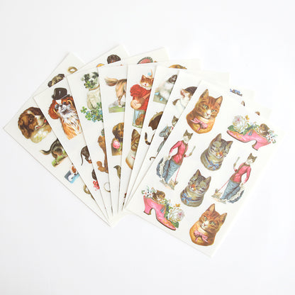 Five sheets of Cute Pet Rub On Transfers with antique-style illustrations of dressed animals and flower-adorned shoes, ideal for pet lovers.