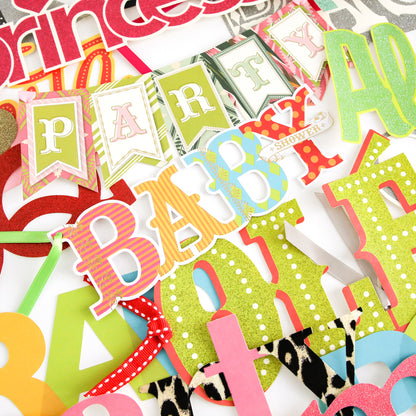 The Party Time Diecut Word Assortment features vibrant cutout letters and shapes that spell out words such as "BABY," "PARTY," and "SHOWER," arranged in a fun, overlapping collage—ideal for adding joyful flair to your handmade cards or scrapbook pages.