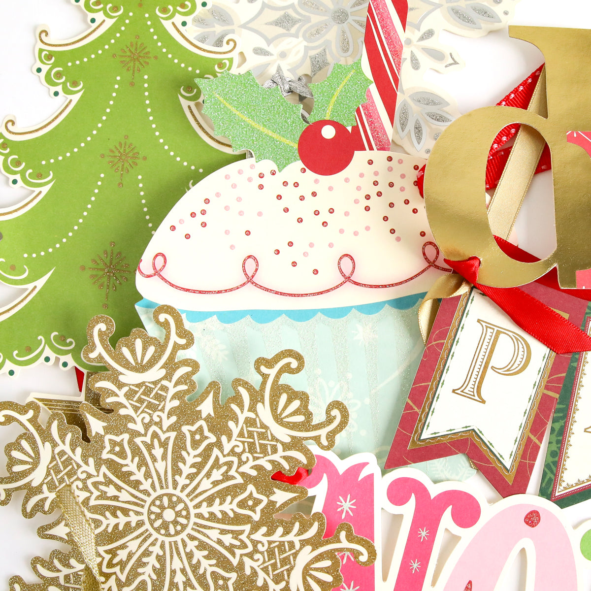 Introducing the Christmas Extreme Diecut Assortment: a delightful collection of Christmas-themed paper diecuts including a green tree, gold snowflake, cupcake, candy cane, and festive banners with red ribbons. Perfect for decorating Christmas cards or adding cheerful flair to scrapbook pages with charming holiday images.