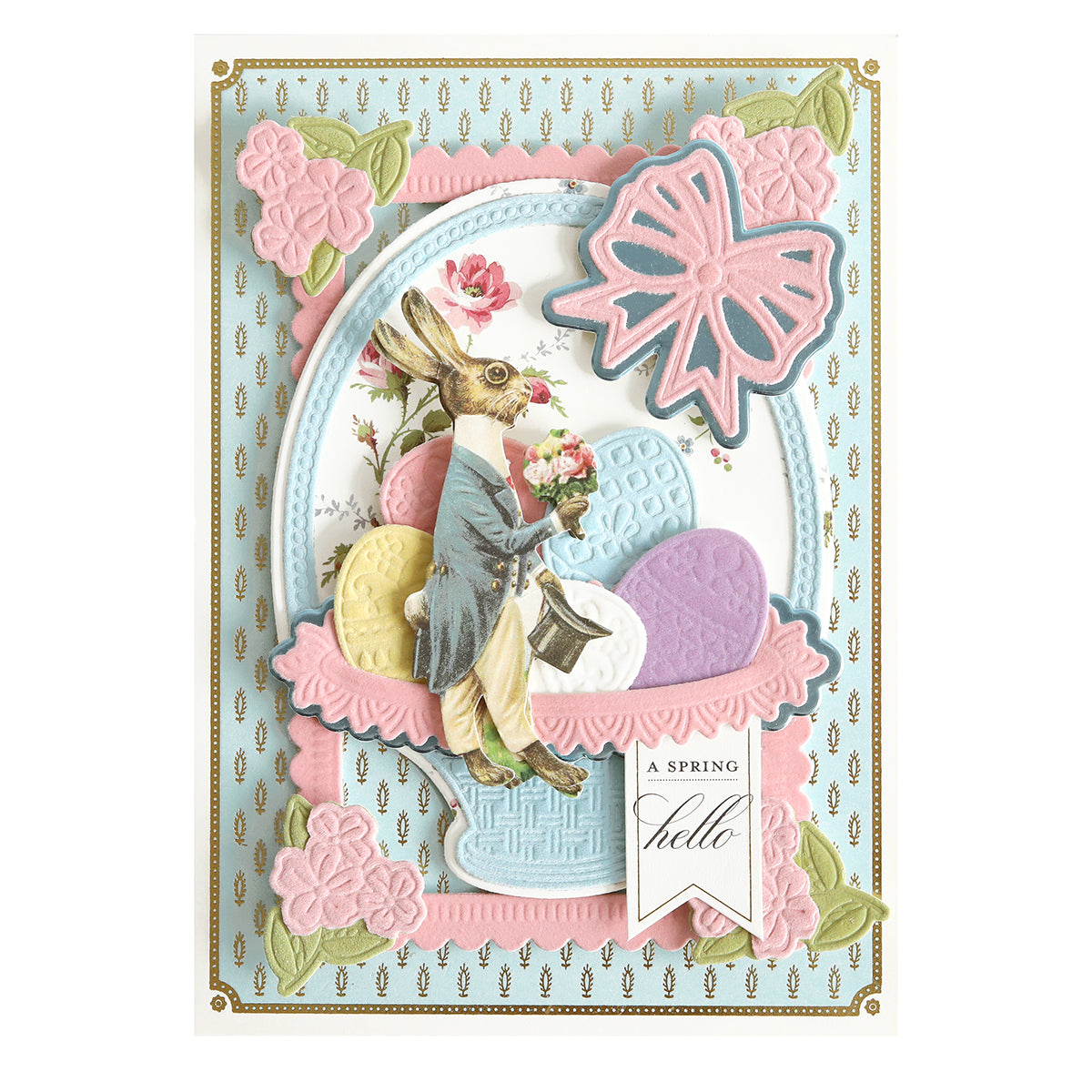 Crafted with Perfect Palette Flocked and Printed Cardstock, this decorative card features a dapper rabbit holding flowers, pastel embossed eggs, pink blooms, and a bold pink bow, plus a tag reading "A SPRING hello.
