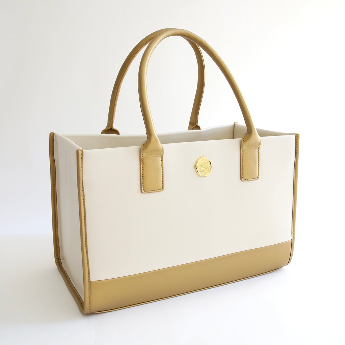 An Empress Tote and Dust Cover on a white background.