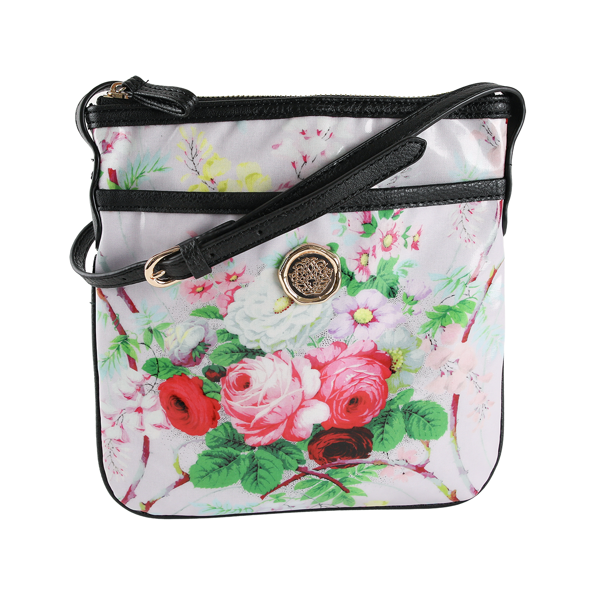 The Lillian Crossbody is a square crossbody purse featuring a black strap, gold buckle, and an elegant floral design with red, pink, and white flowers set against a light background. Crafted from durable laminated cotton, this stylish floral bag is perfect for everyday wear.