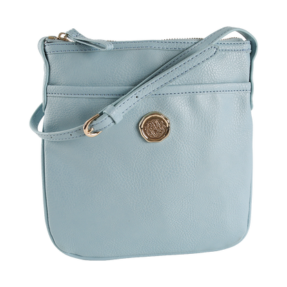 Beach Glass Blue Crossbody Bag made of light blue faux leather with a gold emblem and zipper closure, featuring an adjustable strap, displayed on a plain white background.