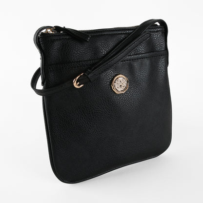 Onyx Black Crossbody Bag crafted from faux leather, highlighted by a gold emblem on the front, features a zippered top and an adjustable shoulder strap, displayed against a plain white background.