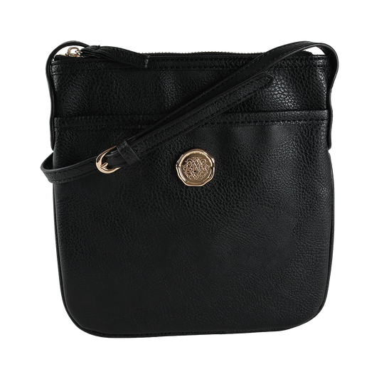 The Onyx Black Crossbody Bag is an elegant women’s shoulder bag crafted from black faux leather, featuring a gold circular emblem and a matching shoulder strap, photographed against a white background.
