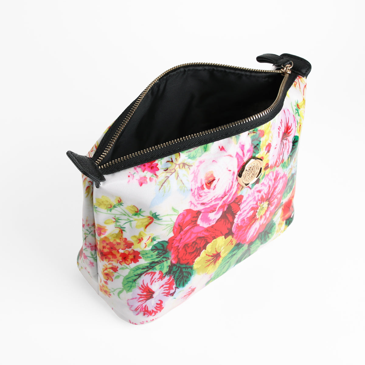 The Annalise Large Cosmetic Bag features a floral pattern, gold zipper, black interior lining, and a circular gold emblem, shown on a white background—perfect as a stylish makeup pouch or travel organizer.