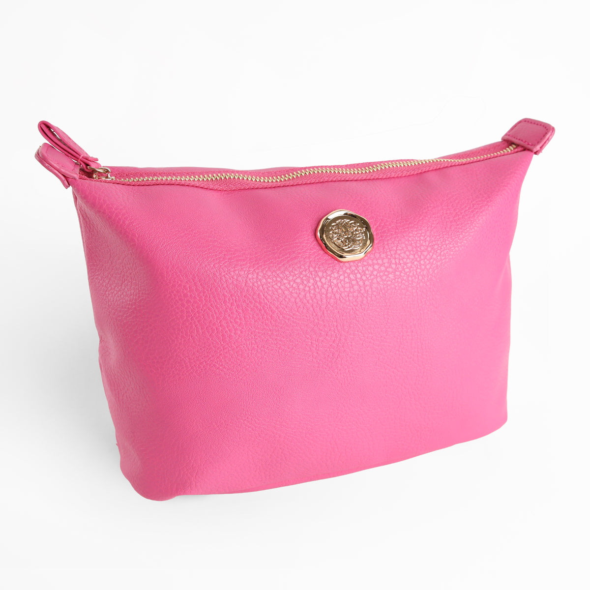 The Raspberry Pink Large Cosmetic Bag is a faux leather zippered pouch featuring a gold circular emblem on the front, displayed against a white background. This spacious makeup bag also functions as a stylish travel toiletry bag, offering both elegance and practicality for your essentials.
