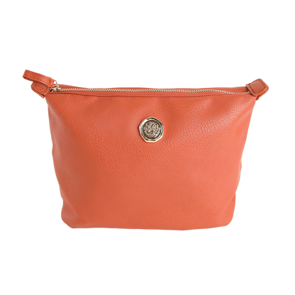 The Tangerine Orange Large Cosmetic Bag is crafted from high-quality faux leather and features a gold circular emblem at the center. Showcased against a plain white background, this spacious travel cosmetic bag highlights its sleek zippered design.