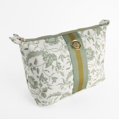 The Green Climbing Rose Large Cosmetic Bag features a zippered closure and showcases a green floral pattern with climbing roses, two vertical green stripes, and a decorative gold emblem at the center.