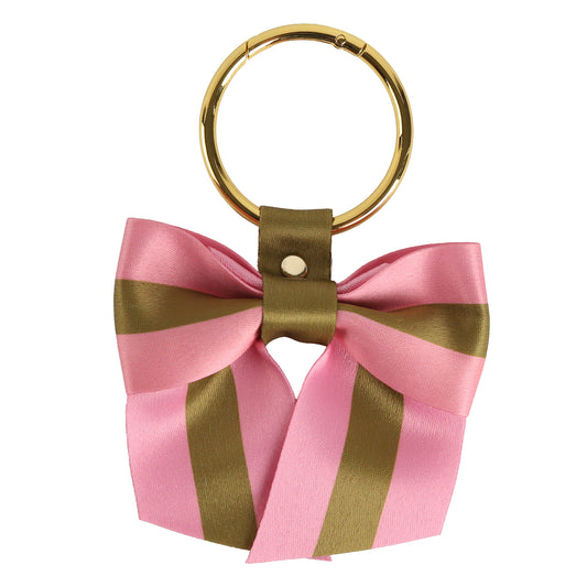 Introducing the Pink Stripe Bag Charm—a gold keyring adorned with a decorative bow crafted from pink and olive green striped ribbon, elegantly secured with an olive-colored band and finished with a chic gold stud. Perfect as a charming accessory for your bag or as a stylish purse charm.