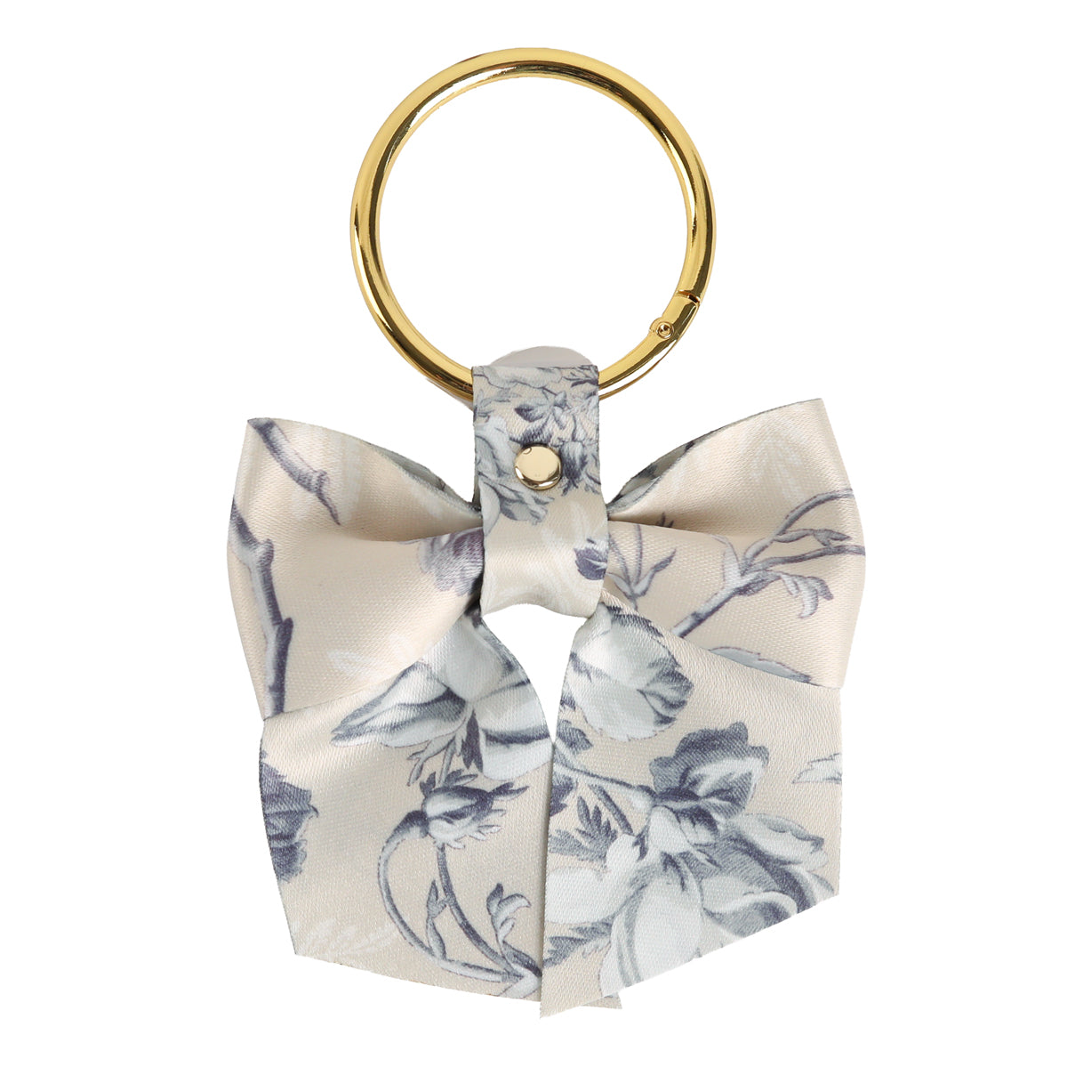 Faded Rose Bag Charm: A gold keyring adorned with a cream and grey floral fabric bow, perfect as a charming floral bag accessory or stylish handbag detail.