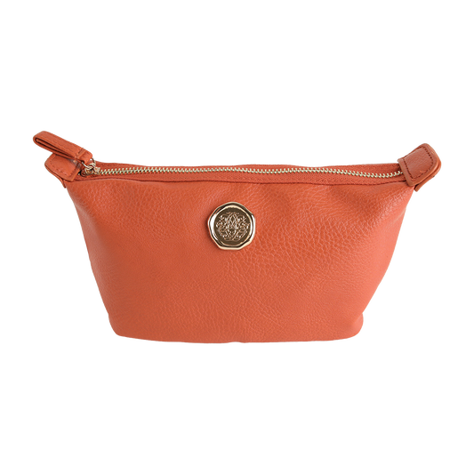 Tangerine Orange Small Cosmetic Bag crafted from premium faux leather, featuring a gold zipper and a central circular gold emblem, photographed against a plain white background. This mini travel makeup bag is both stylish and functional for on-the-go organization.