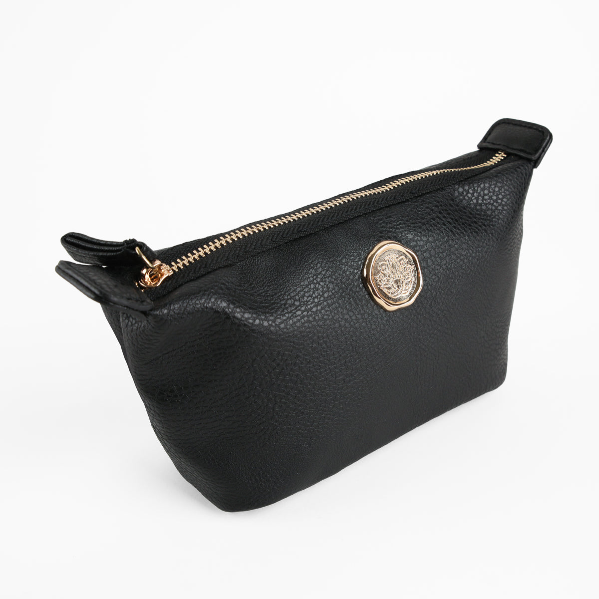 The Onyx Black Small Cosmetic Bag, featuring black faux leather with a gold zipper and a round gold emblem on the side, is displayed against a plain white background.