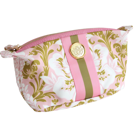 The Pink Damask Small Cosmetic is a durable cotton zippered pouch with a pink and green floral pattern, gold emblem, central olive stripe, and pink ribbon—ideal for organizing your travel essentials.
