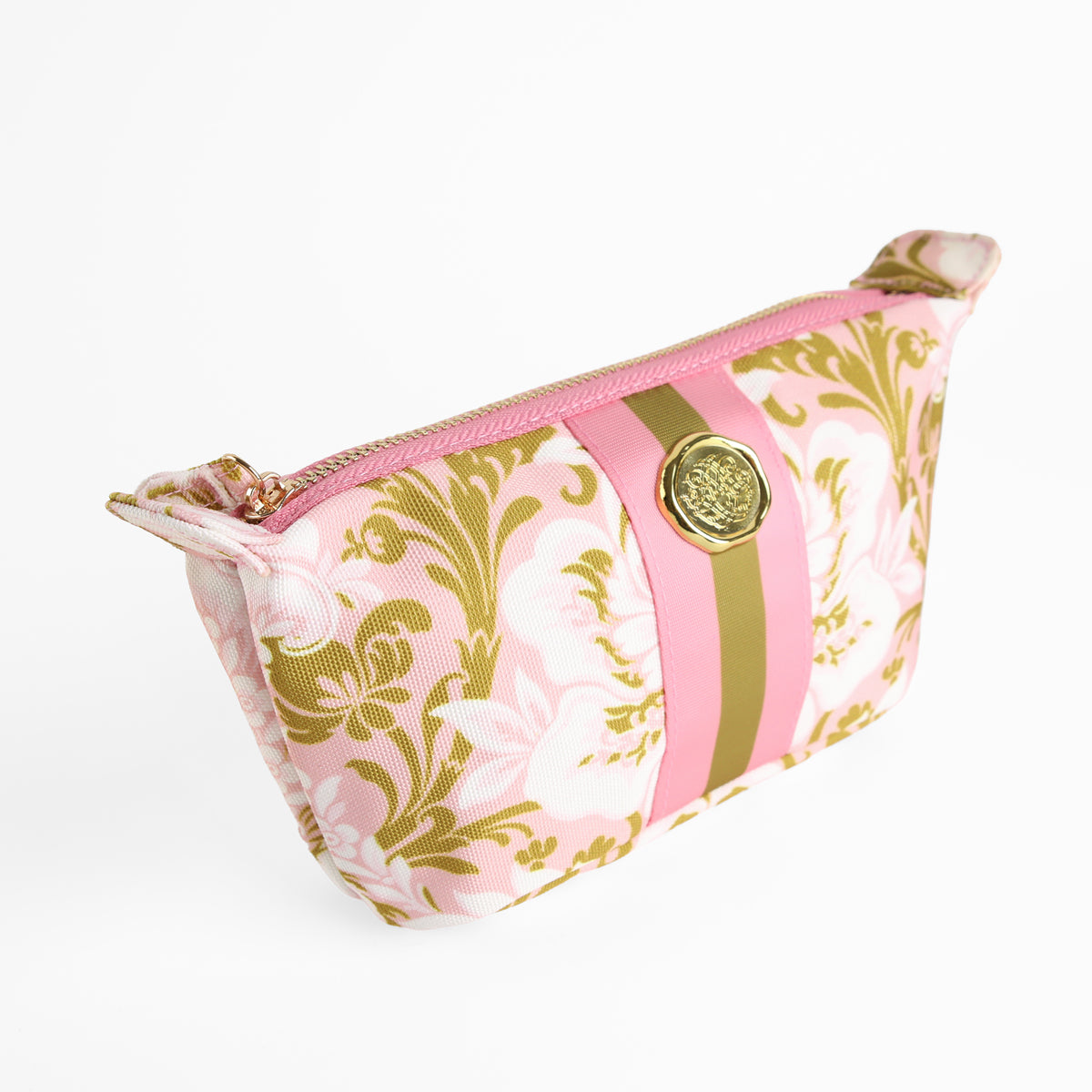 The Pink Damask Small Cosmetic Bag, adorned with gold and pink floral detailing and a gold medallion accent on the front, is displayed against a plain white background.