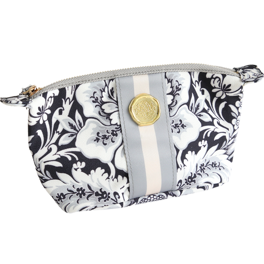 The Damask Noire Small Cosmetic is a durable cotton bag with a black and white floral pattern, two vertical gray and beige stripes, and a central gold emblem—ideal for travel.