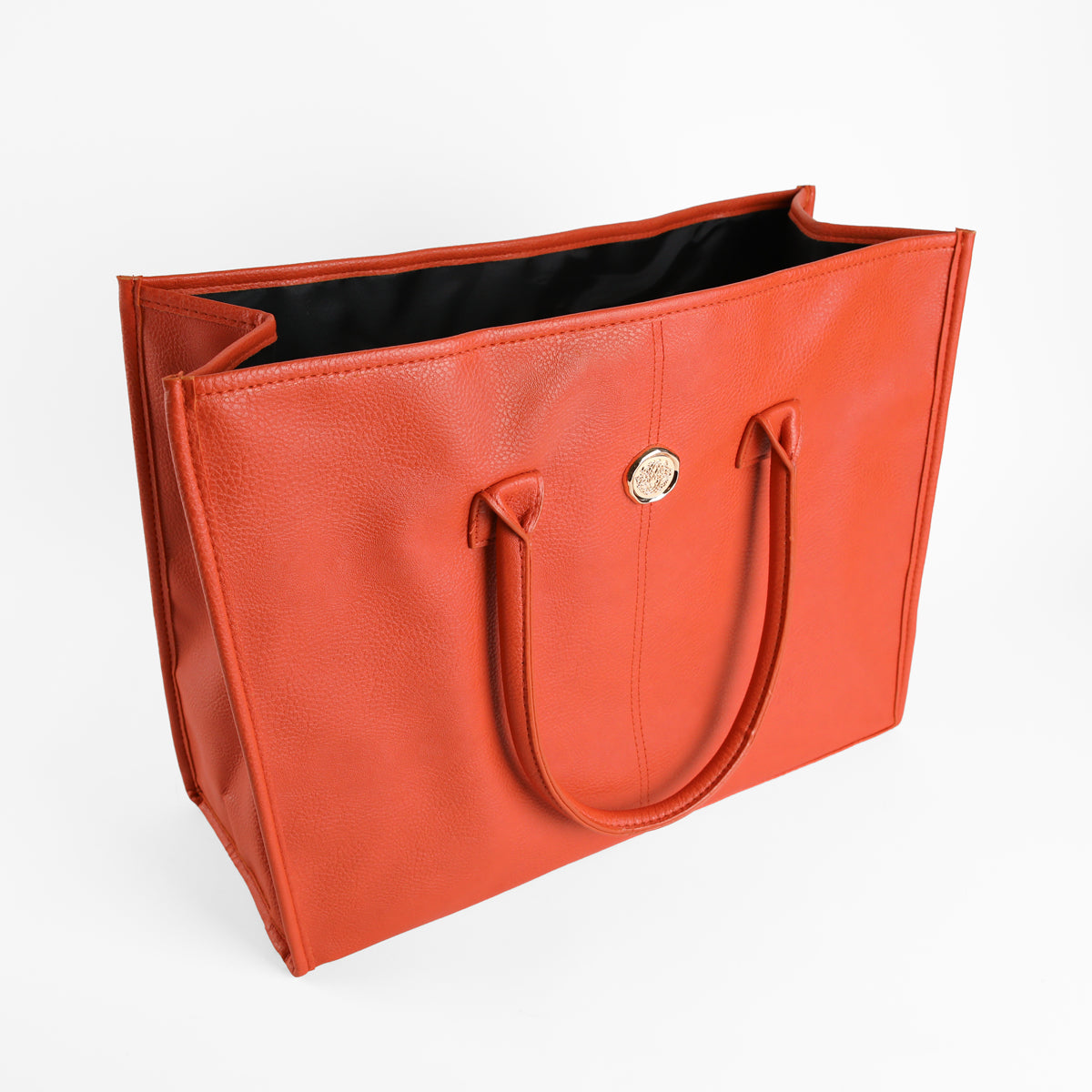 Tangerine Orange Tote Bag for women, crafted from faux leather with two handles, gold button detail on the front, and a black inner lining. Displayed on a plain white background, this spacious shoulder bag blends style and functionality for everyday use.