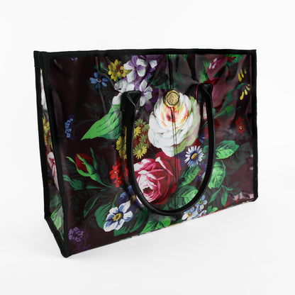Introducing the Astrid Tote Bag: a large rectangular tote for women featuring sturdy black handles, a glossy laminated cotton finish, and a vibrant floral design with roses and assorted flowers set against a dark background. Stylish yet durable, this floral tote is ideal for everyday use.