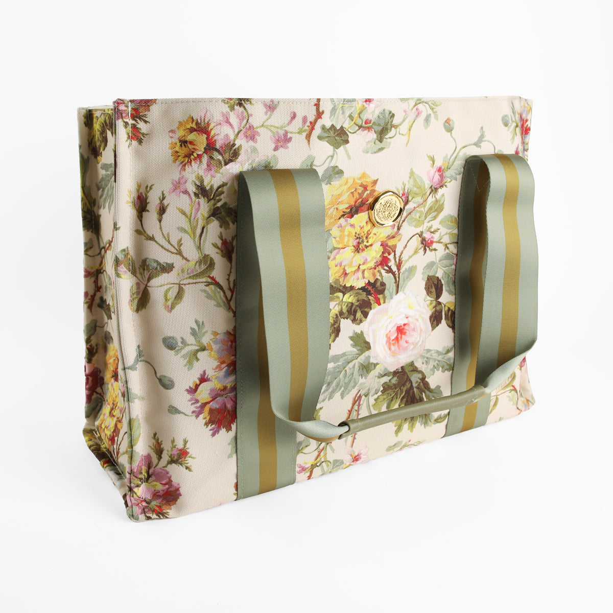 The Francesca Tote Bag is a rectangular canvas tote featuring a botanical print and green striped handles, displayed on a white background.