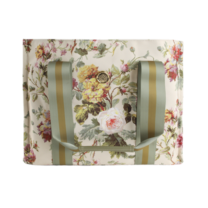 Introducing the Francesca Tote Bag: a spacious canvas tote featuring green striped handles and a beautiful floral print of roses and leaves on a light background—ideal as a floral market bag and a thoughtful gift for women.